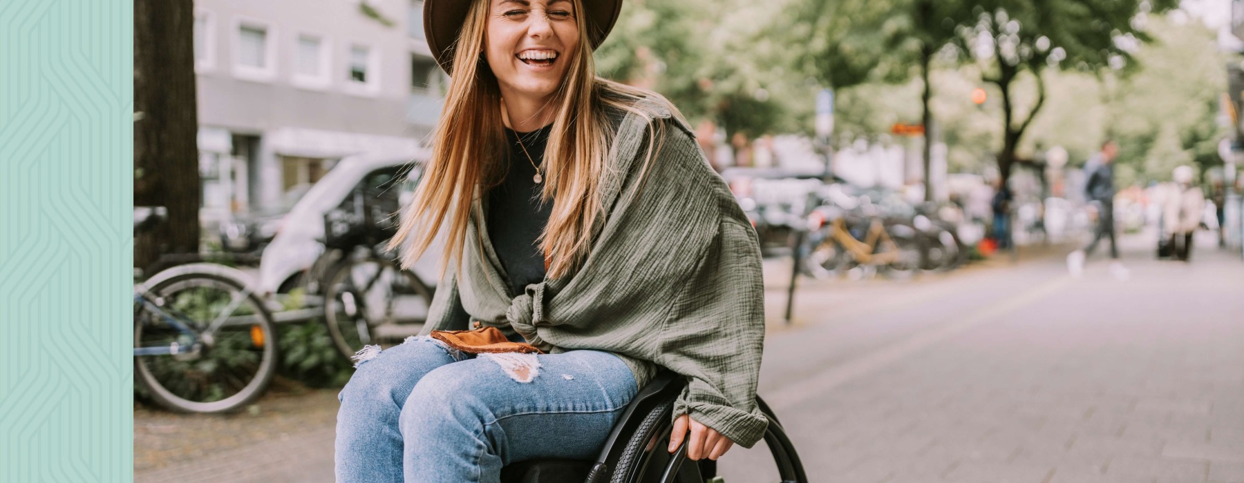 a woman in a wheelchair smiling